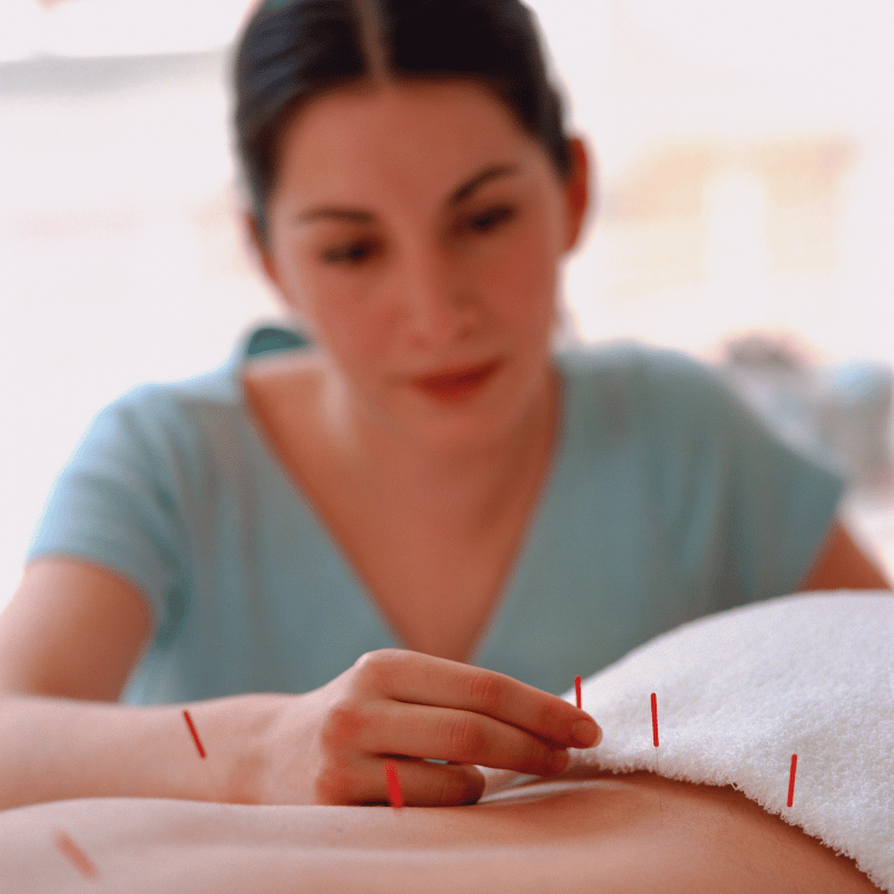 acupuncturist and patient