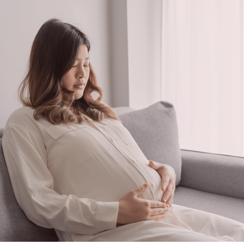 An overwhelmed pregnant woman