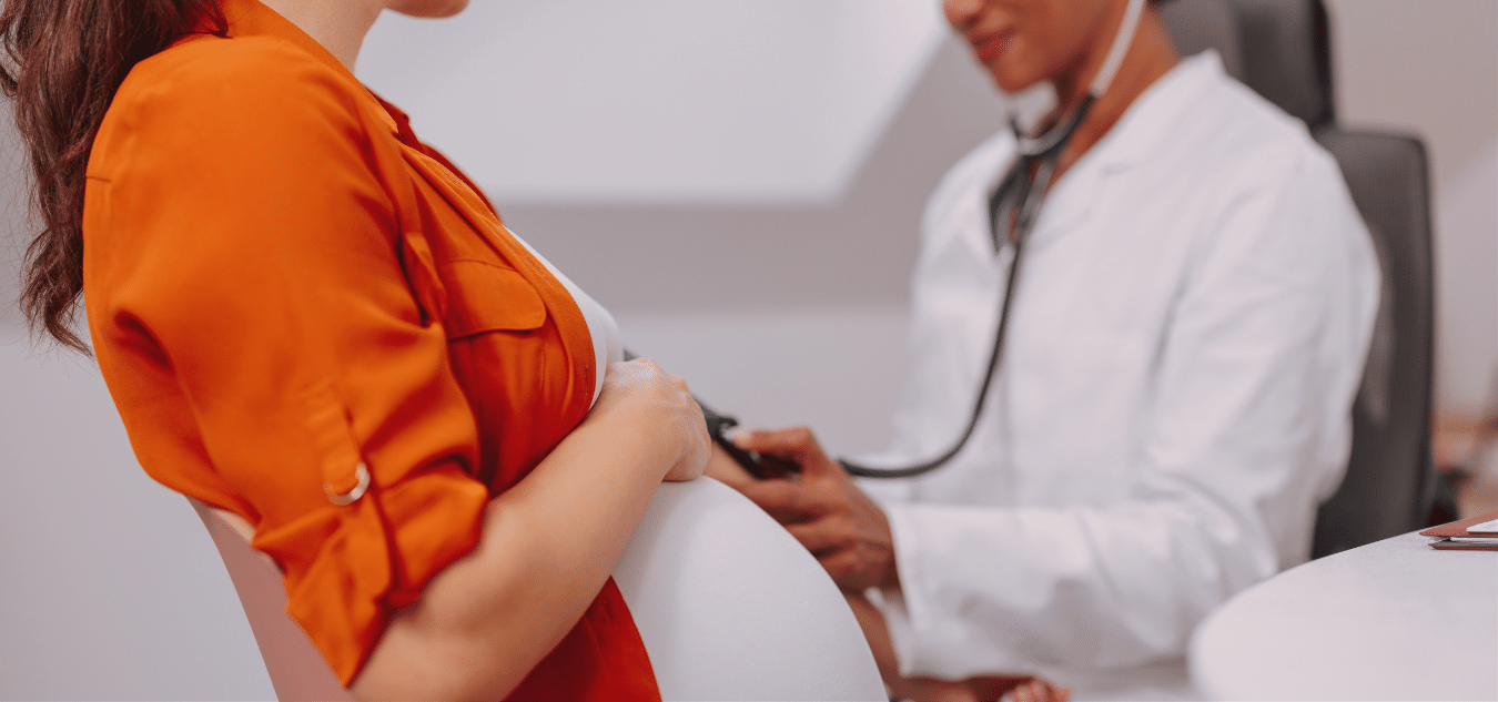 picture of an OBGYN performing checks on a client